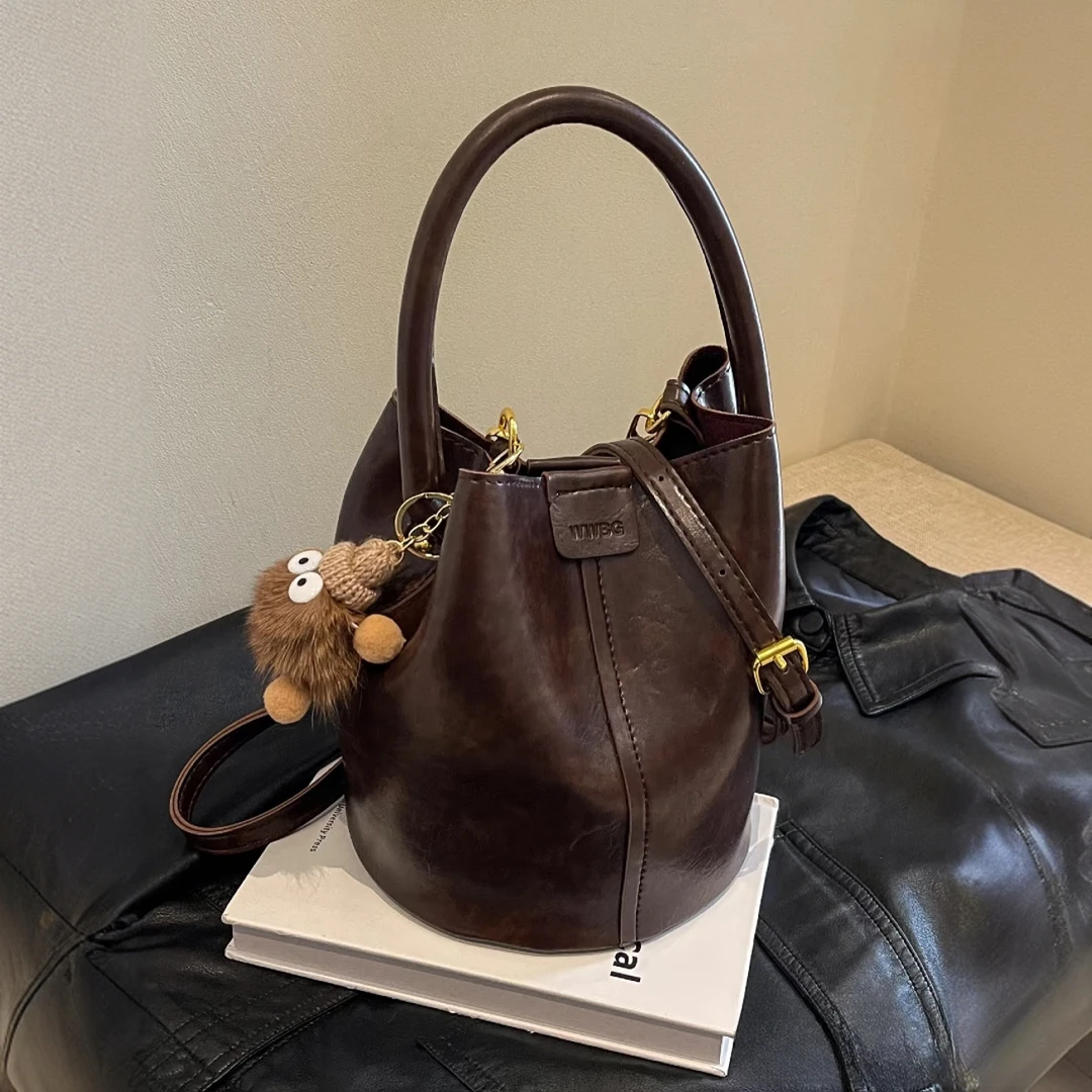 复古休闲多口袋款女士斜挎包肩包