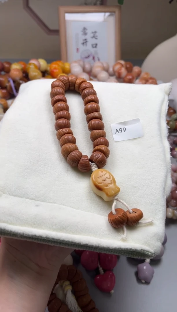 菩提根/象牙果手串A99凤羽肠手持15mm一串通货随机