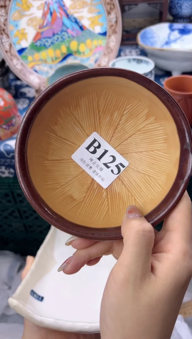 瓷片越****?   B125
