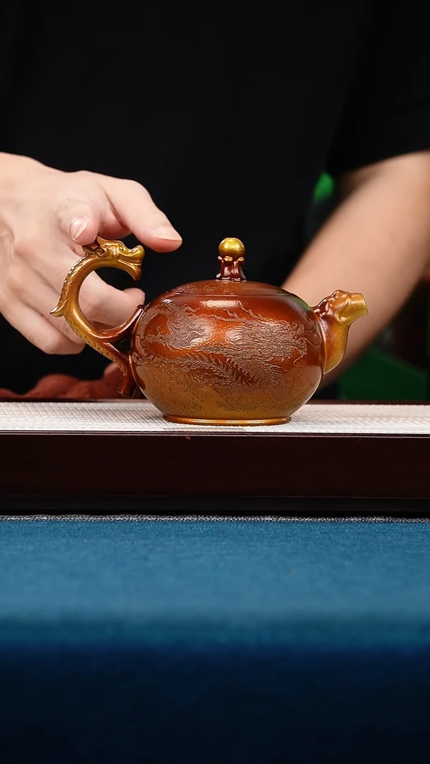 茶壶紫砂金贝烧龙珠