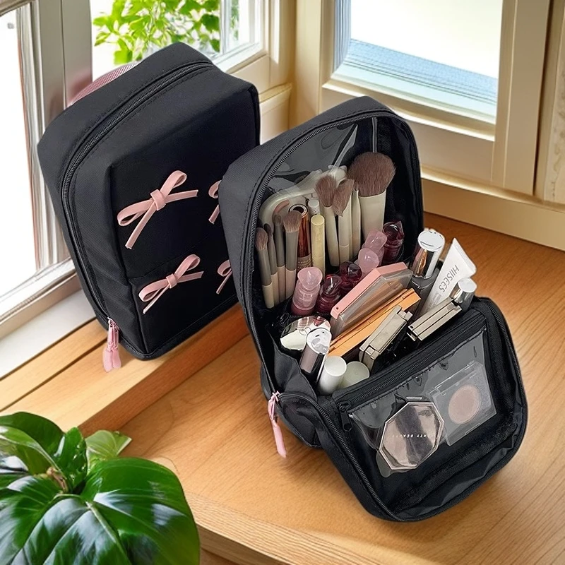 手提蝴蝶结立式便携化妆包女大容量爆款外出分区化妆盒收纳盒简约