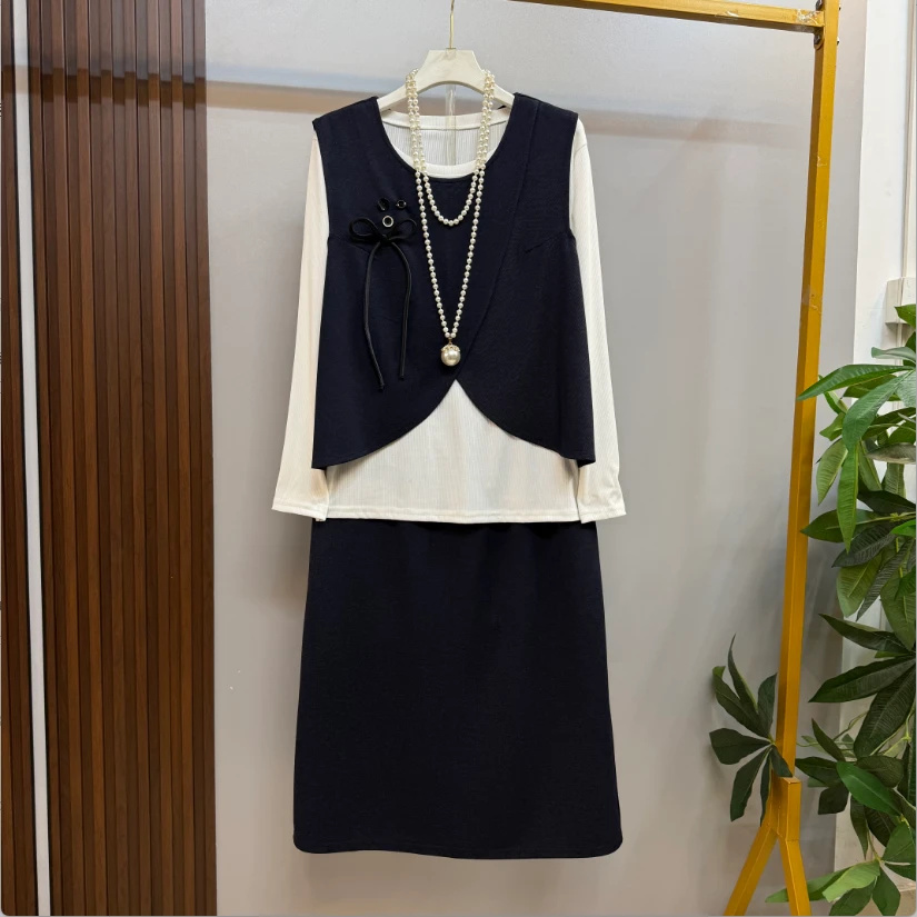 早秋新款欧货洋气减龄蝴蝶结美背马甲十打底衫十半身裙三件套