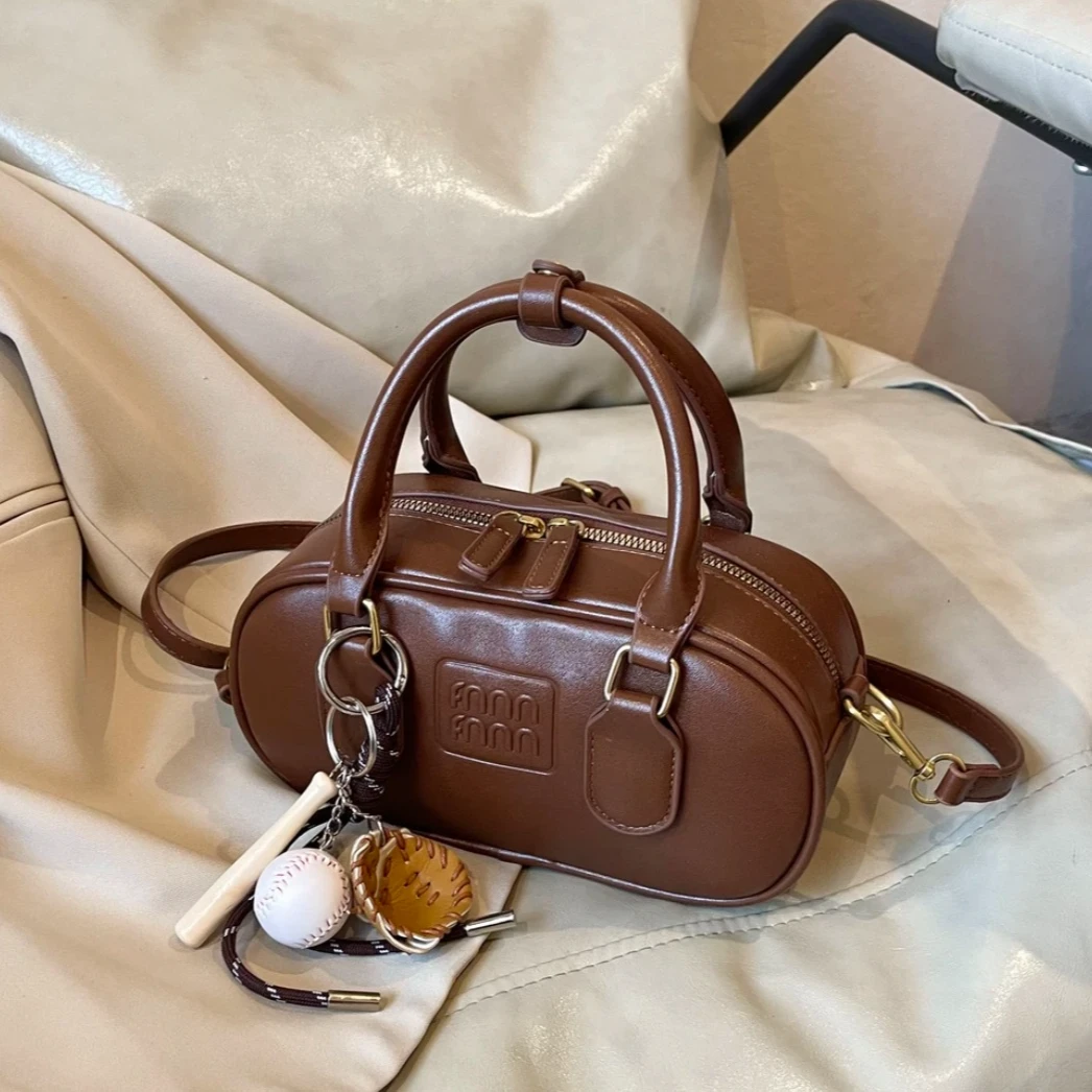 手提保龄球包包女秋冬2024新款潮小方包大容量通勤包斜挎包