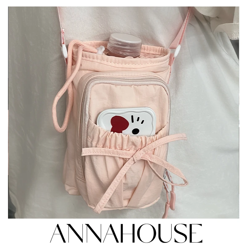 ANNAHOUSE2025新款户外轻便结束口斜挎包防水手机包水壶包YC