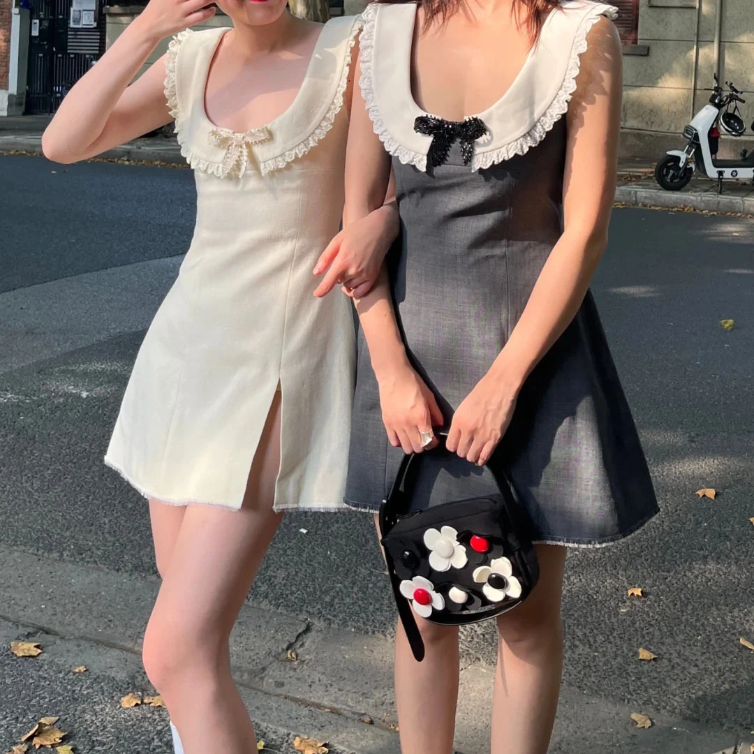 宅女同款无袖收腰连衣裙侧开叉毛边串珠蝴蝶结少女短裙