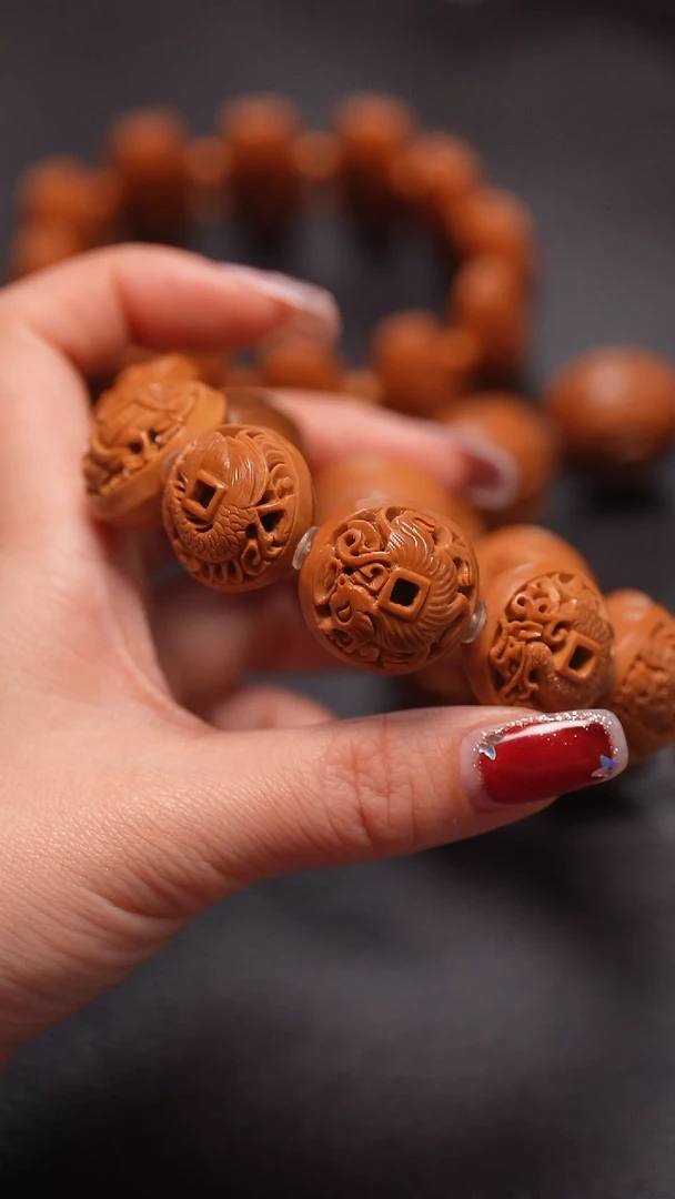 手串橄榄核2.3+/镂空四花四象八卦五帝钱