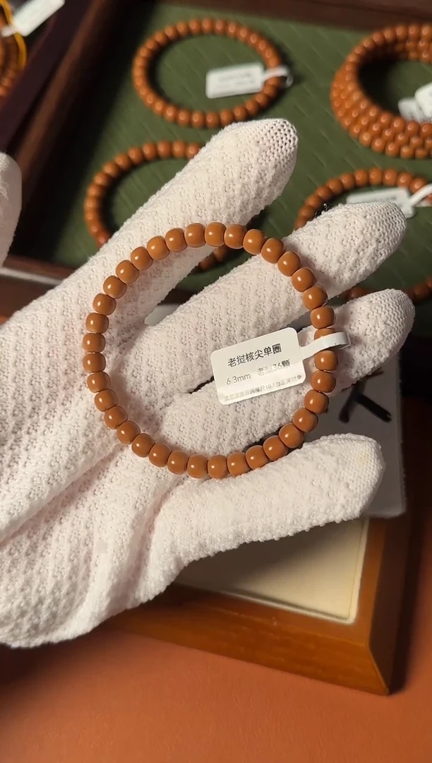 手串橄榄核【168核尖】6.3mm老挝一代核尖老型单圈 三花倒角白