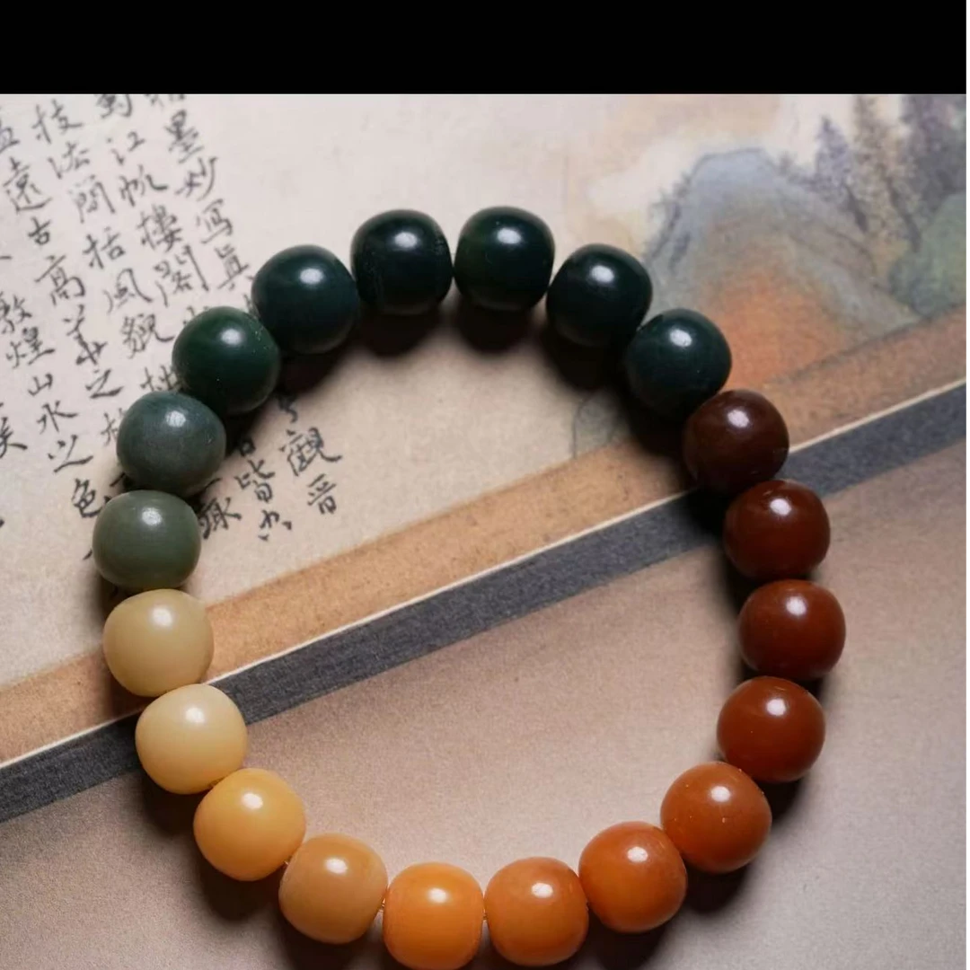 【惊喜】----多宝渐变菩提手串一条..（佛）