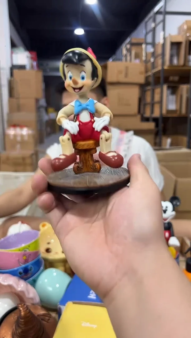 瓷片树脂摇头匹诺曹摆件
