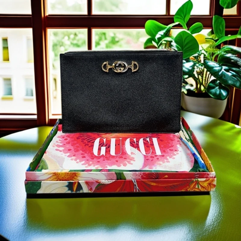 95新 GUCCI/古驰   黑色zumi手拿包 1869 3106