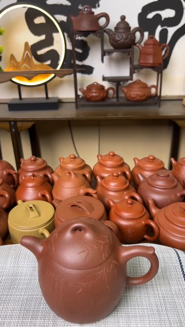 茶壶紫泥臭*子秦权紫砂壶刻绘500CC