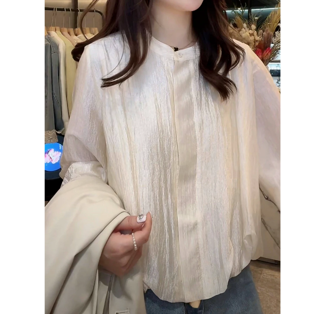 设计感纽扣纯色圆领衬衫女2025春季爆款洋气优雅风外穿长袖衬衣