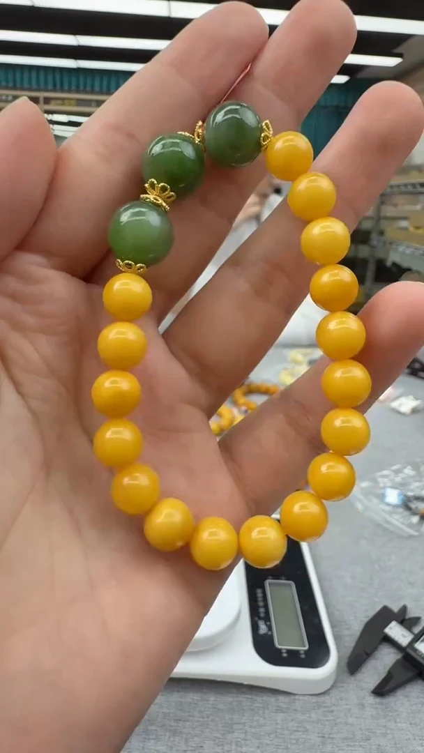 未镶嵌琥珀手链198秒拍号 假一罚三
