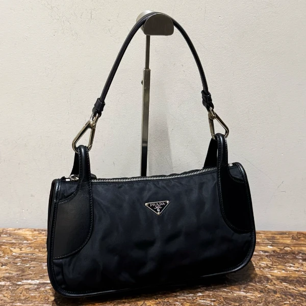 95新 Prada/普拉达 黑银吊桥单肩包