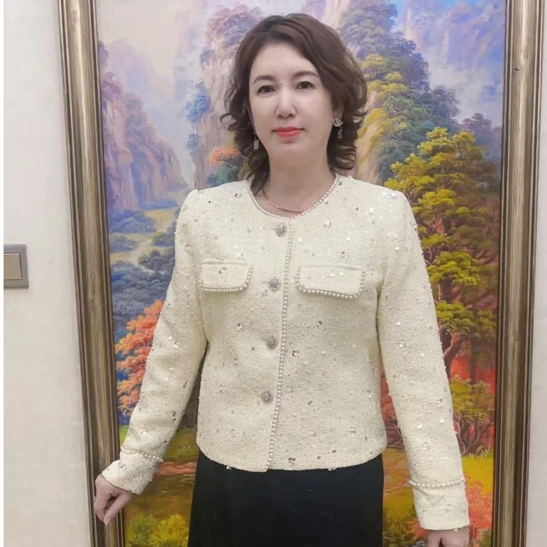 茹茹时装白色珍珠小香风外套