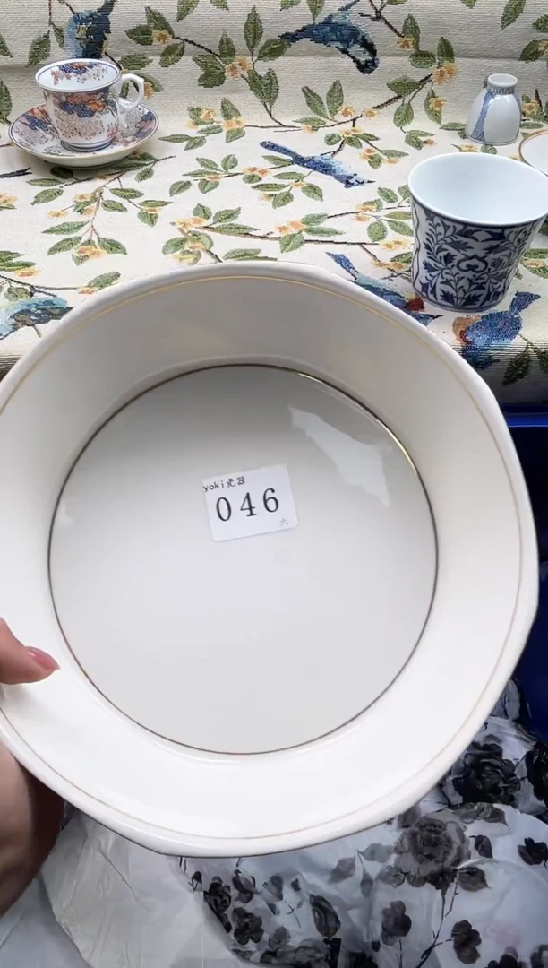 瓷片我****?             046