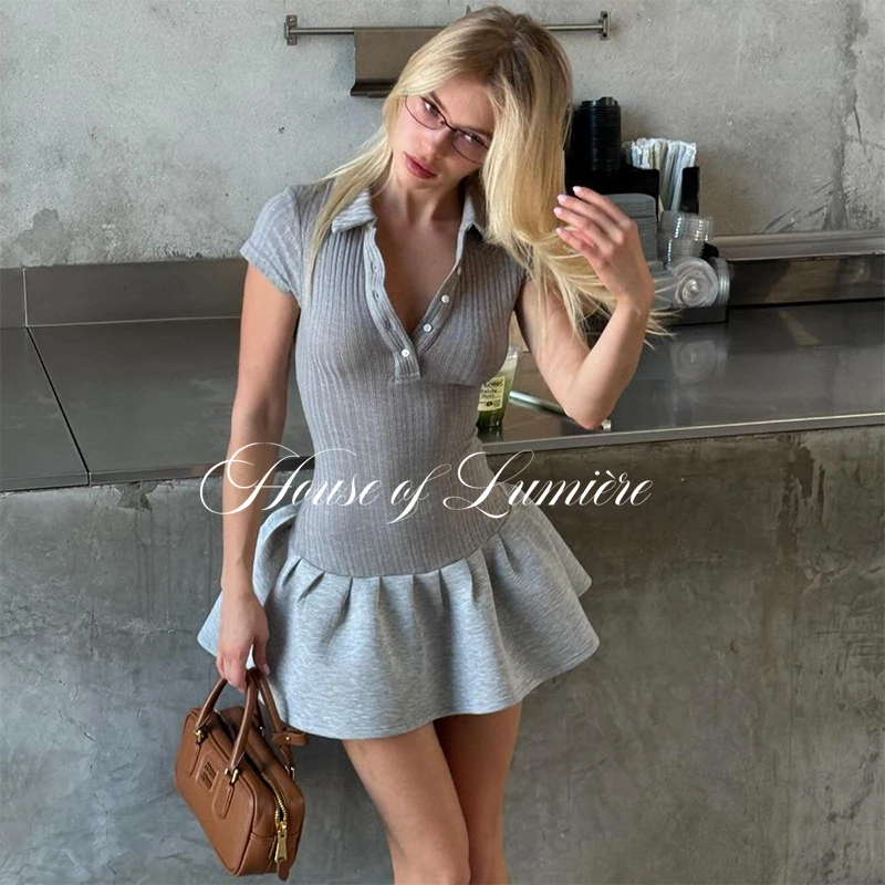 法式翻领开扣短袖连衣裙夏季新品收腰显瘦针织Polo领荷叶边A字裙