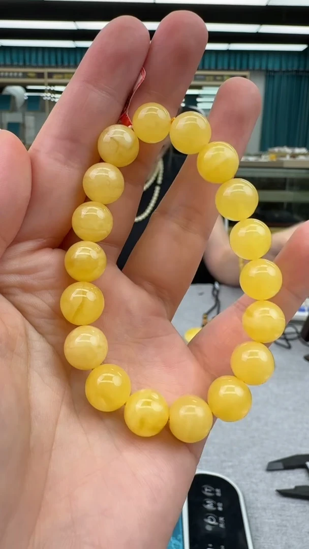 未镶嵌琥珀手链26秒拍号 假一罚三