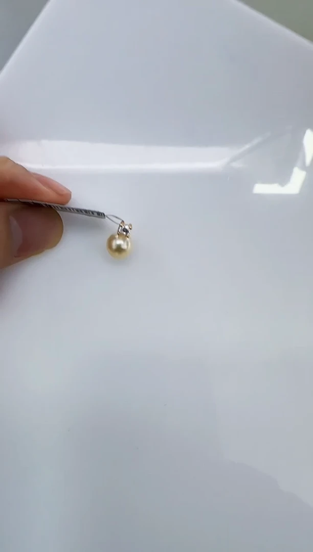 银S925镶嵌海水珍珠DA羽皇金吊坠8-9 y504