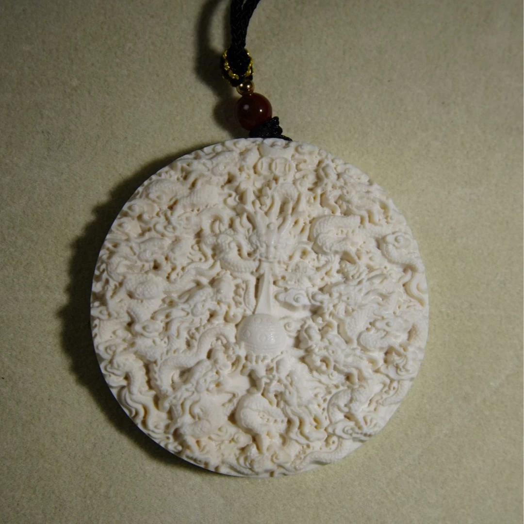猛犸牙九龙戏珠圆牌53mm