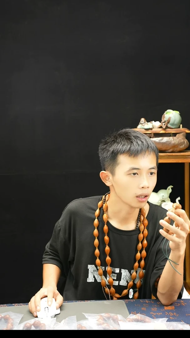 手串橄榄核19.27梅林红河