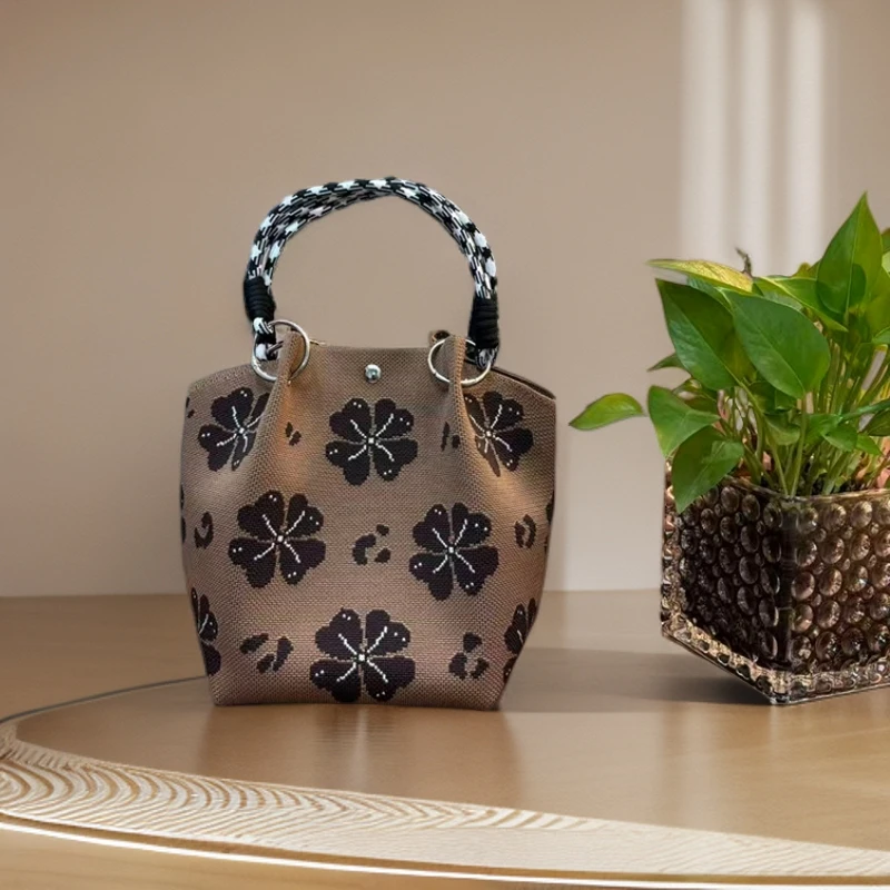 2025年春夏新款水桶包手拎包时尚慵懒拍照打卡出片手提包包百搭