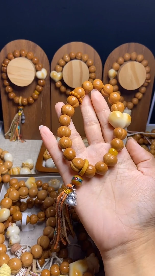 猴头核桃手串零****ღ全品龙炎爱心橄榄壳藏式流苏福塔手持款