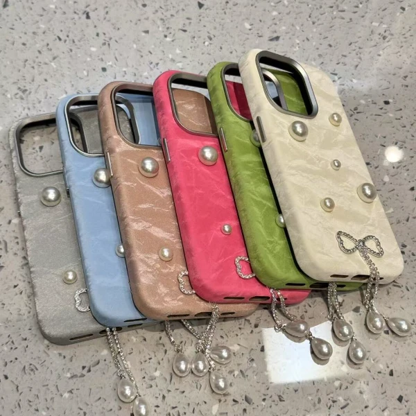 丝绒闪钻蝴蝶结适用iphone16promax手机壳苹果15新款14流苏13少女