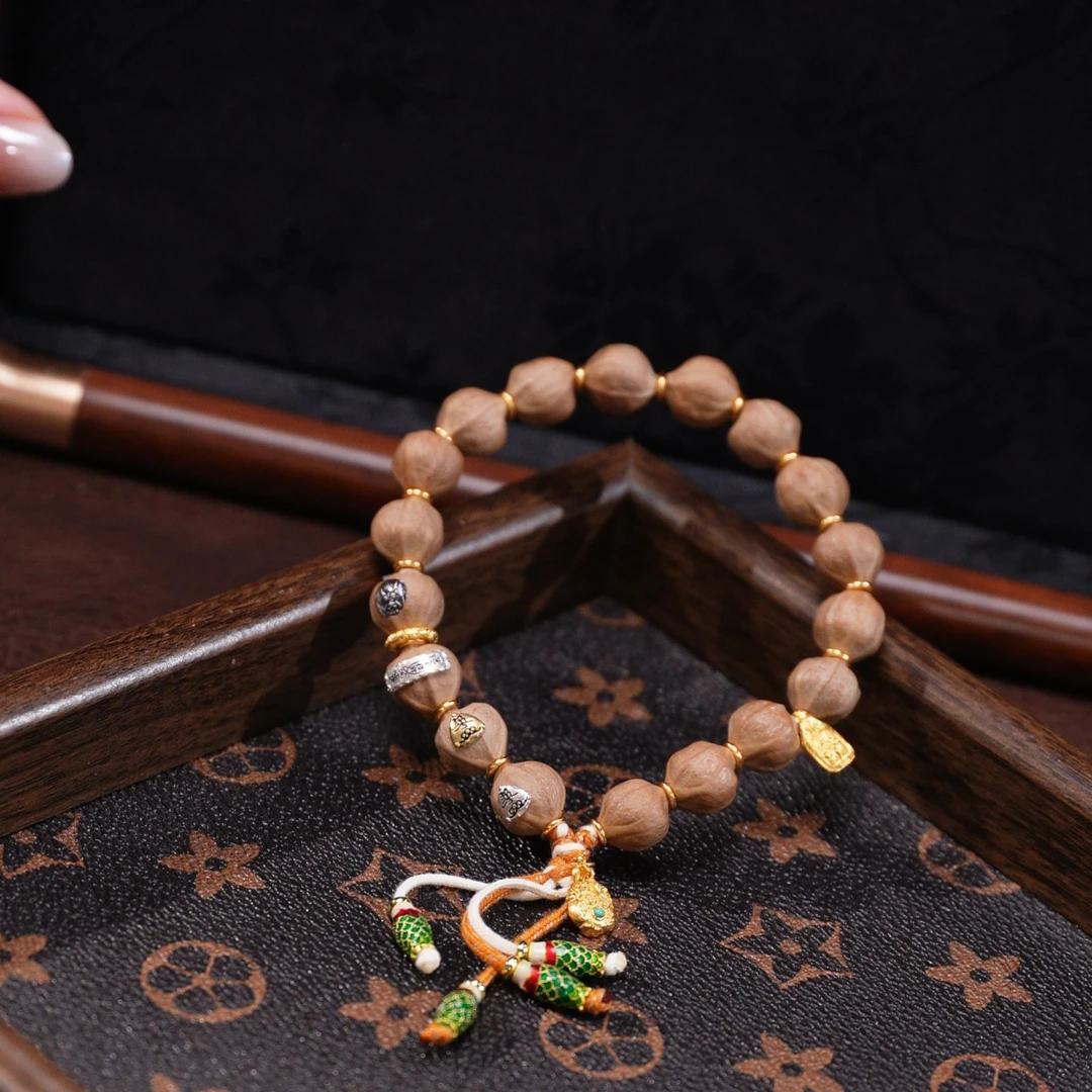 【核在江湖】橄榄核素串原生态 蜜桃臀橄榄核手串1.1左右A008