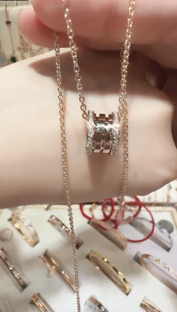 18K金镶嵌套链钻石边钻可弹露露通套链