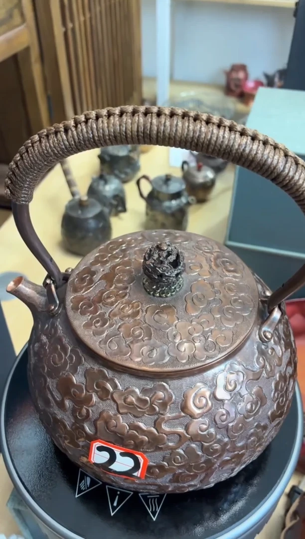 随***名1.3提梁祥云錾刻壶