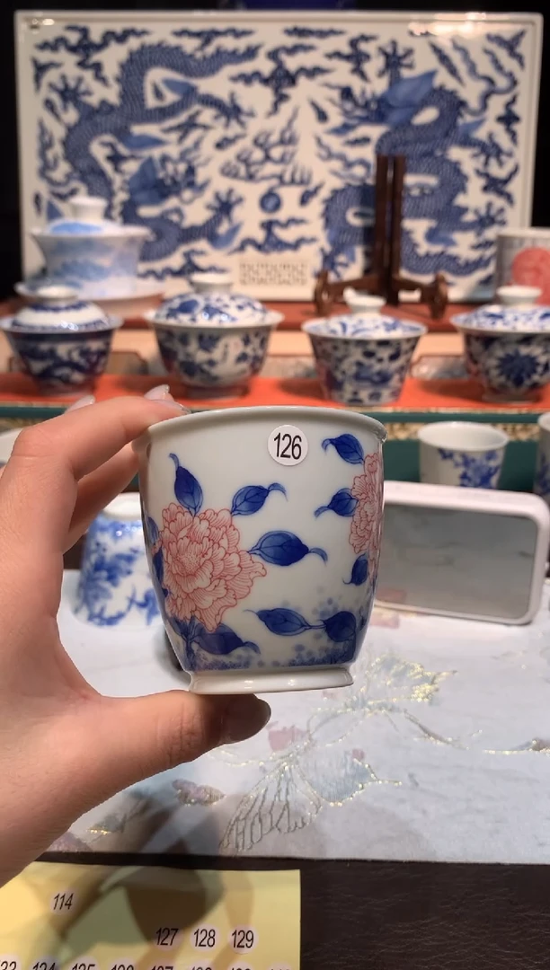 朝**倦126青花釉下红花卉杯额
