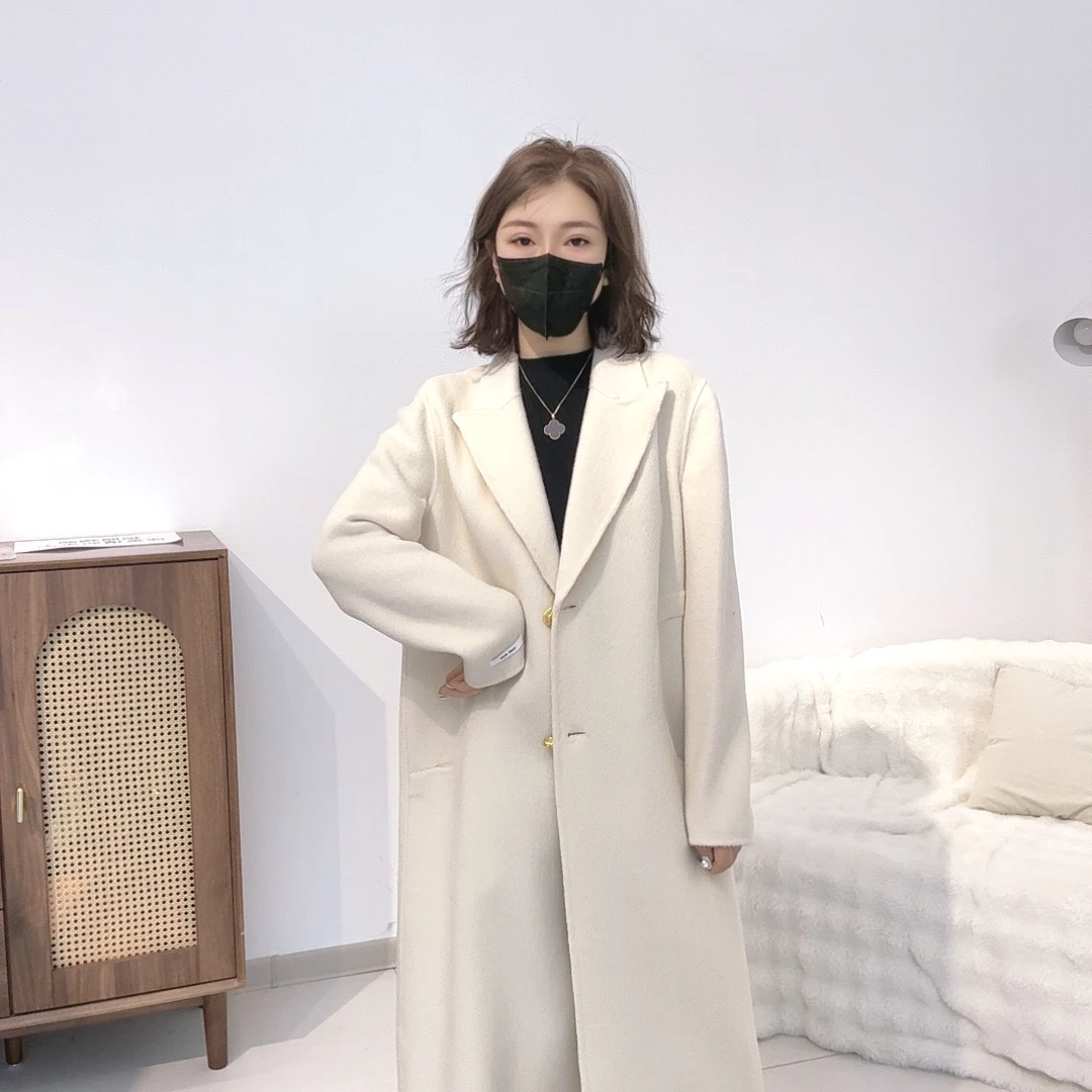 （10045）鄂市产地 三粒金扣月牙口袋时尚气质长款外套