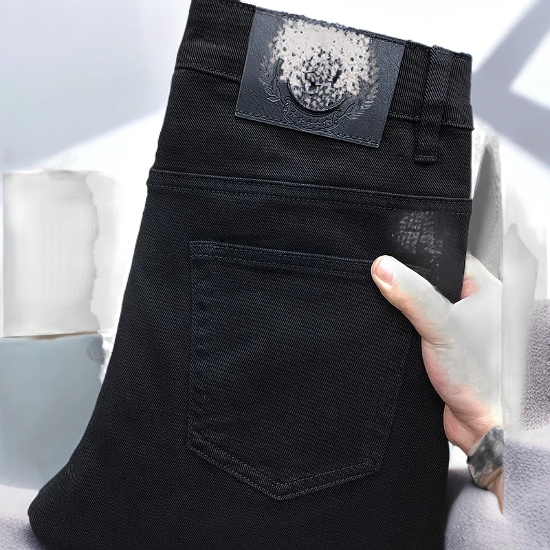 昆加希毕高端秋季黑色牛仔长裤男弹力修身小脚休闲九分裤宽松直筒