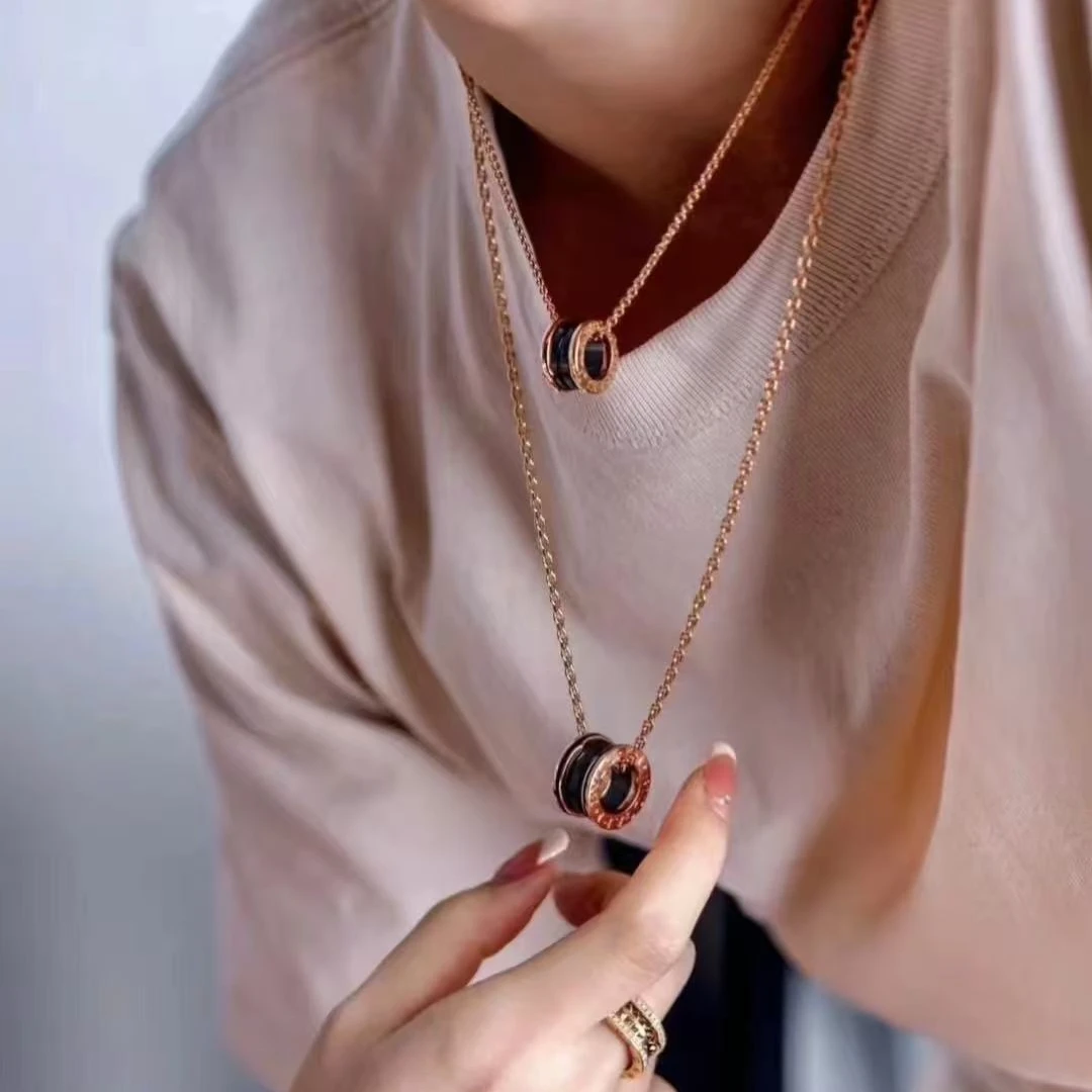 #粉色专享#003 弹簧黑陶瓷绳结微笑百搭项链时尚