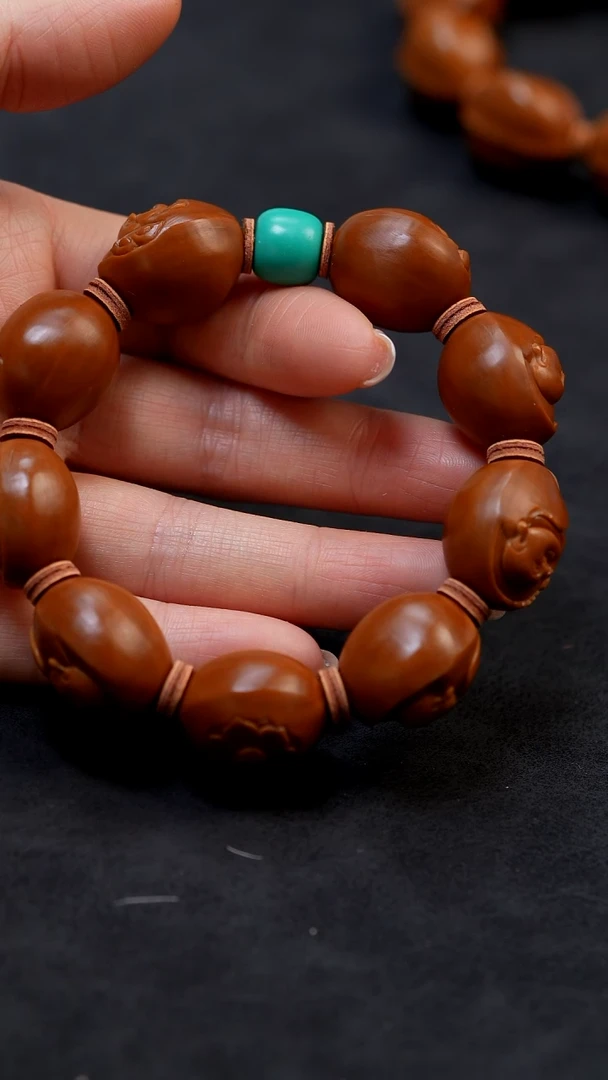 【闪购商品】橄榄核手串浮雕弥勒