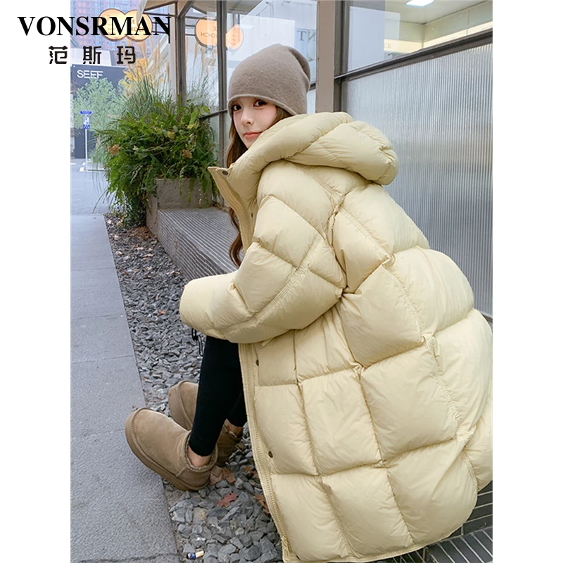 奶黄色连帽羽绒服女中长款2025年冬季新款学院风保暖过膝加厚外套