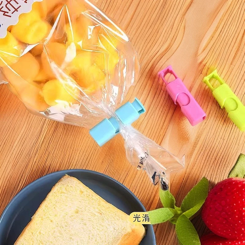 零食袋夹子面包袋夹防潮保鲜夹塑料袋弹簧封口夹奶粉袋按压密封夹