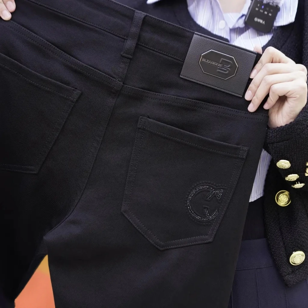 高端欧货轻奢牛仔裤男士秋冬新款修身百搭纯黑不褪色休闲柔软裤子