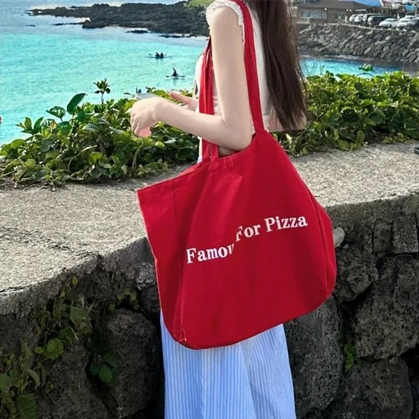 韩系ins风字母帆布包包2025新款红色学生通勤百搭大容量单肩包女