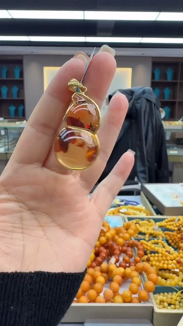 琥珀颈饰未镶嵌184秒拍号 假一罚三