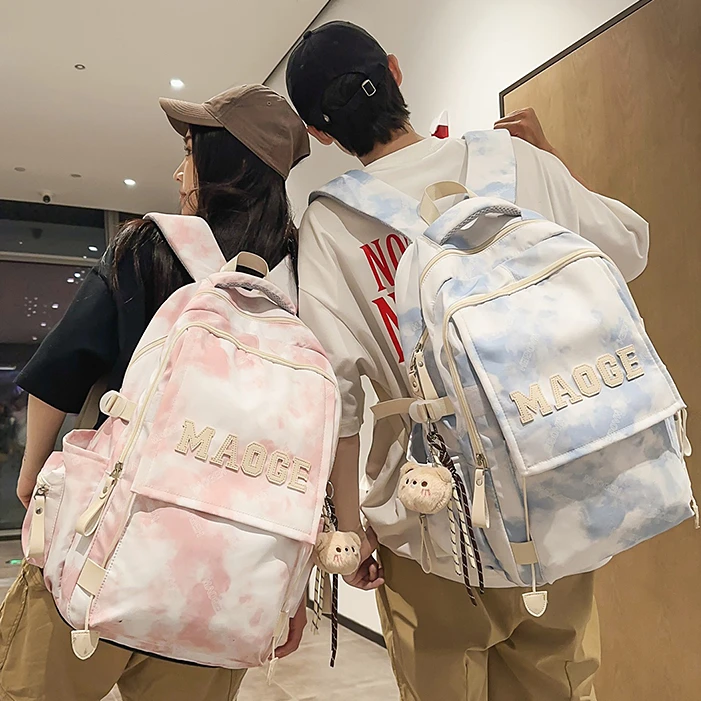 高颜值小众扎染书包女初中小学生减负大容量双肩包高中大学生背包