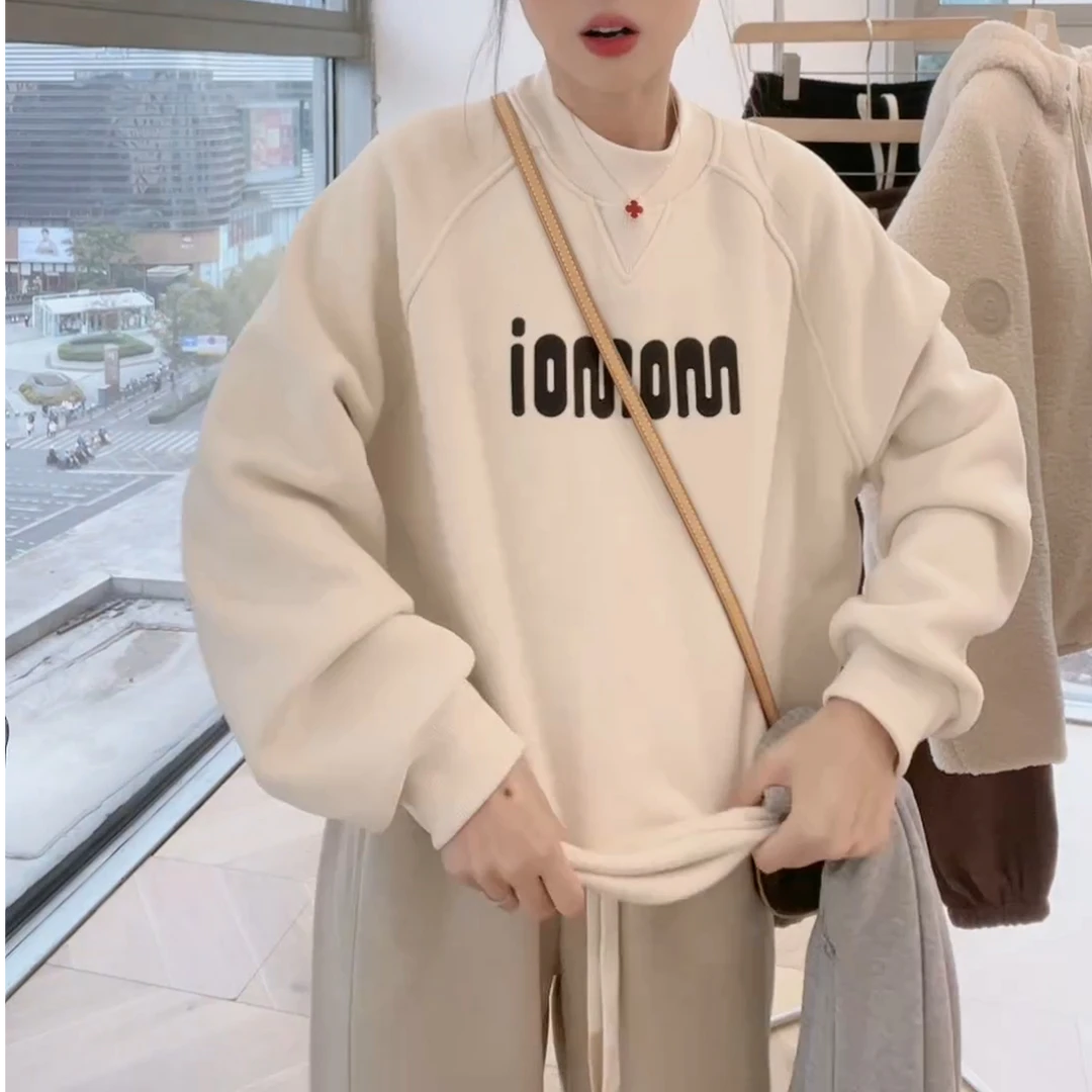 新款韩版显瘦女士长袖圆领个性宽松洋汽上衣卫衣LK2500387-1