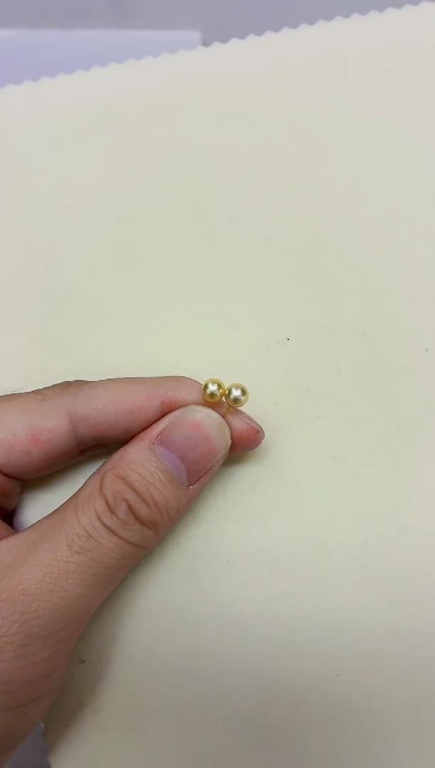18K金镶嵌DA海水珍珠羽皇金耳钉5-6 y221