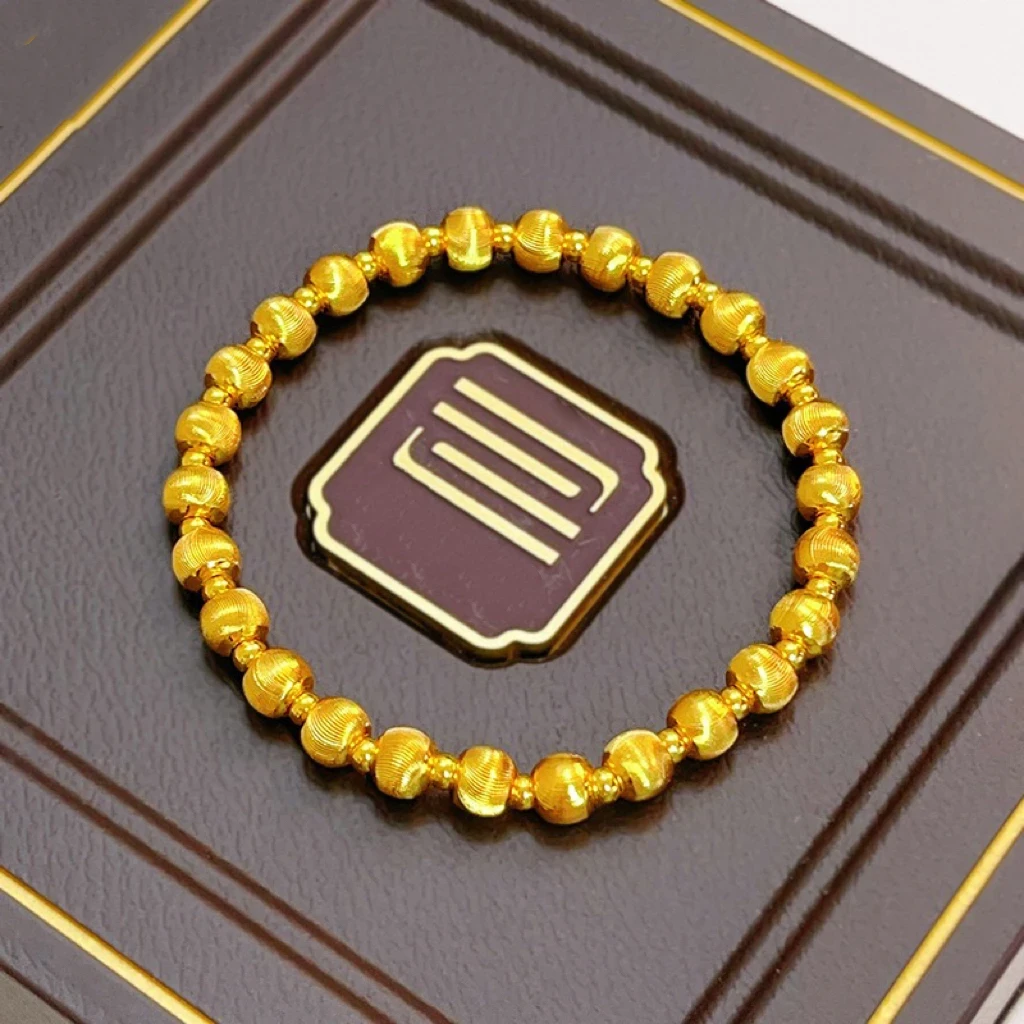 铜合金手链 时尚轻奢猫眼石手链女士简约光珠弹力金色手串气质潮