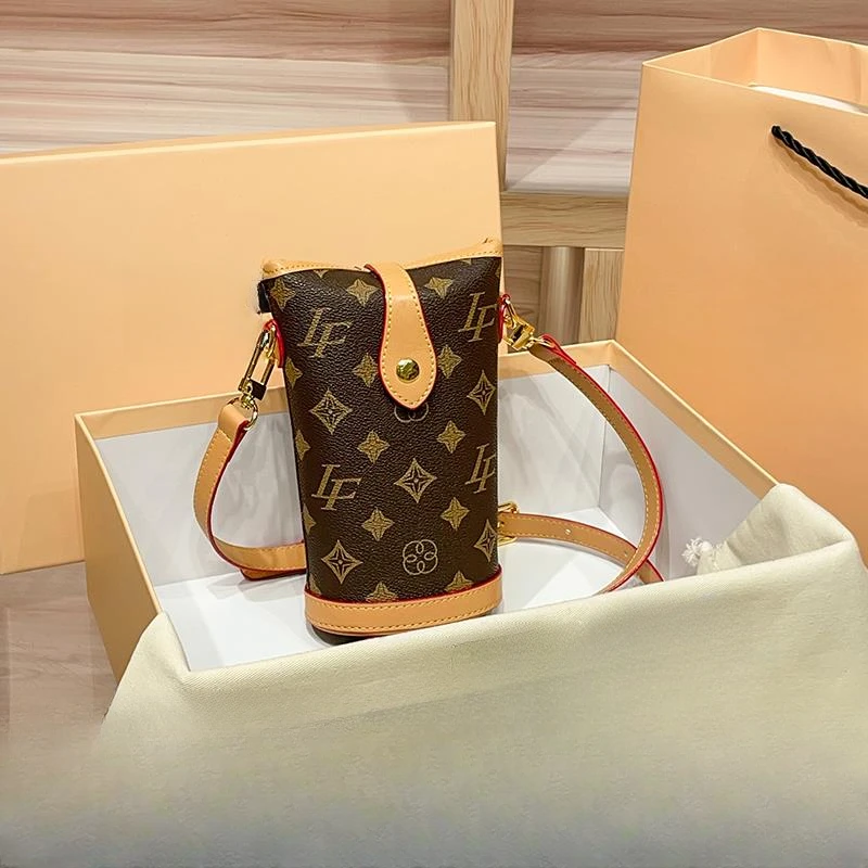 香港品牌老花手机包轻奢斜挎包包女2026新款设计感迷你单肩小包包