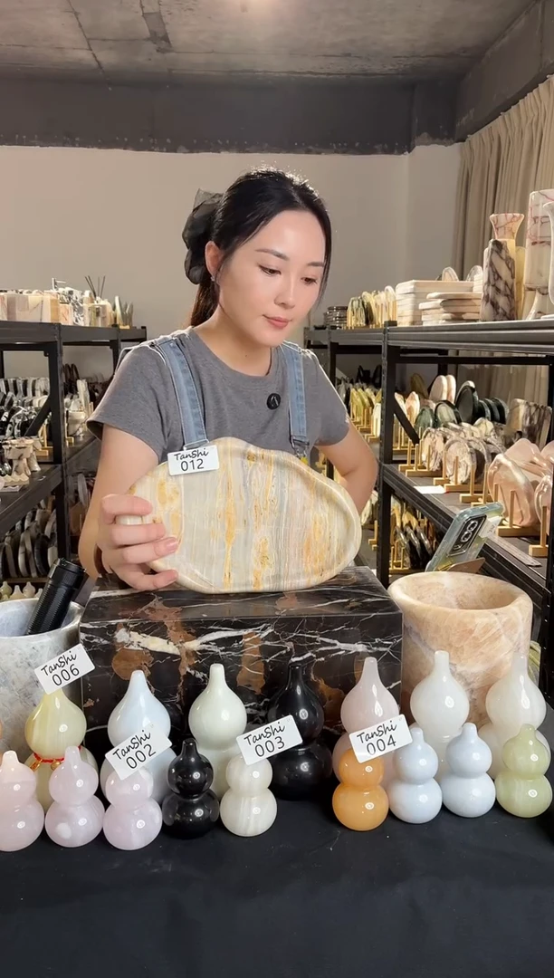 石材012金孔雀云朵盘