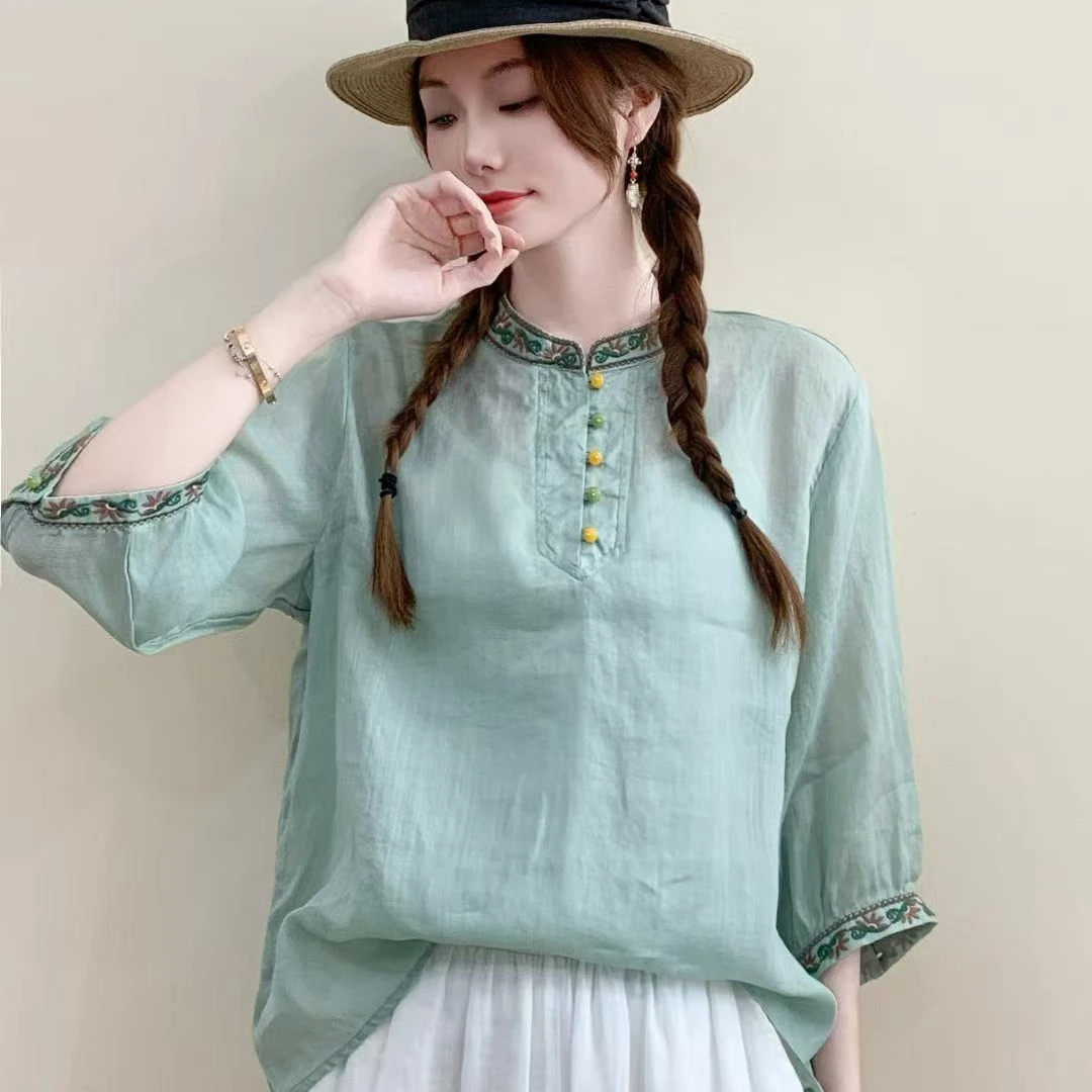 新中式女装2025春新款通勤复古立领琉璃扣刺绣苎麻七分袖宽松衬衫