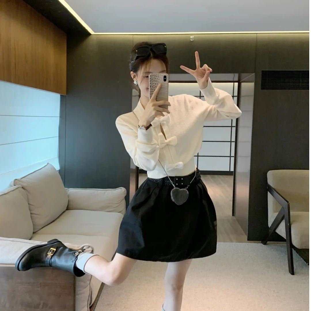 韩系甜美少女风蝴蝶结针织衫女2025秋季新款下摆收腰圆领长袖上衣