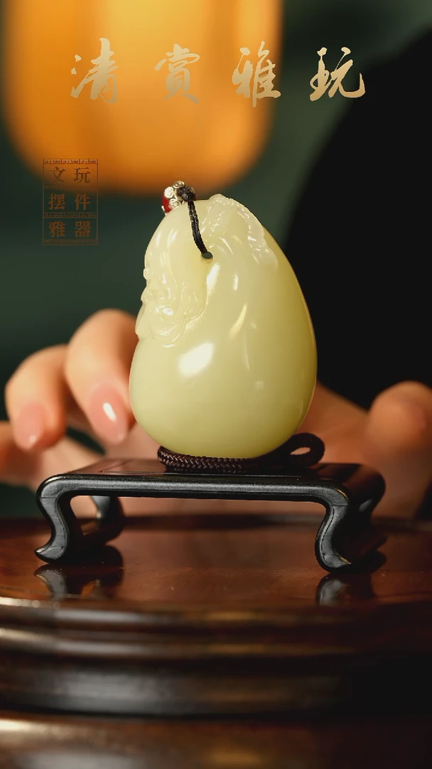 玉《钱袋子富得流油》手把件摆件